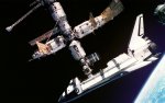 Atlantis-Space-Shuttle-Docking-ISS-1680x1050.jpg